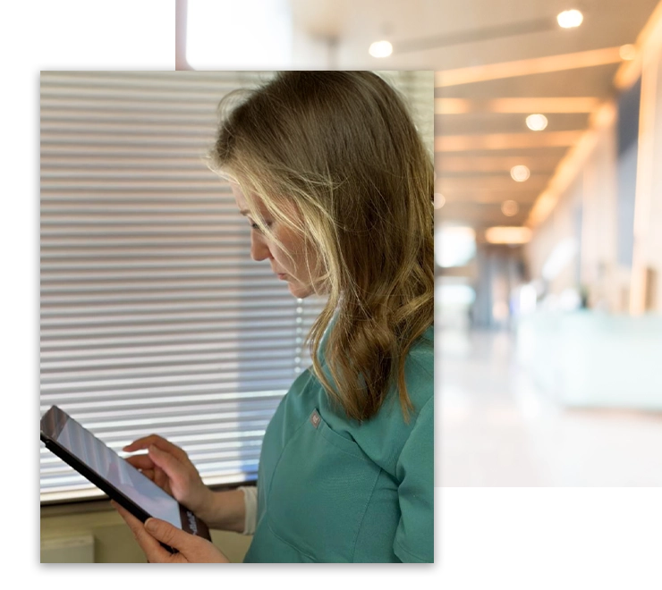 Chiropractic Anchorage AK Patient Checking In On Tablet